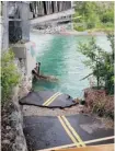  ?? Gavin Young/Calgary Herald/Files ?? A path under a CPR bridge in Bowness was washed away in the June flood.