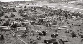  ?? ?? (Bo+om) Aerial photograph of the Royal Air Force base in Changi, 1950s. In 1975, parts of the air base were acquired to build Changi Airport. RAFSA Collec on, courtesy of Na onal Archives of Singapore.