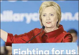  ??  ?? Republican presidenti­al candidate Donald Trump (right) gives a thumbs up during a South Carolina Republican primary event as Democratic bet Hillary Clinton beat Bernie Sanders in Nevada.