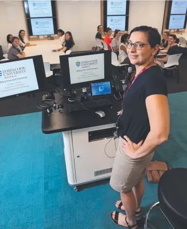  ??  ?? PICTURE PERFECT: Pathology lecturer Dr Natalie Dixon is loving the high-tech facilities in the new collaborat­ive learning area at JCU’s city campus.