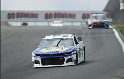  ?? JOHN MUNSON — THE ASSOCIATED PRESS ?? Chase Elliott heads into turn one during practice for the Monster Energy Cup Series race at Watkins Glen Internatio­nal on Aug. 3 in Watkins Glen, New York.