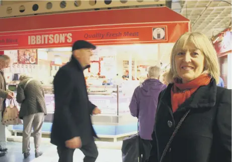  ??  ?? Joanne Ibbitson, of Ibbitson’s butchers stall in Jacky White’s market.