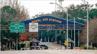  ?? JOSH BRASTED / GETTY IMAGES ?? The main gate of the Pensacola Naval Air Station is closed Friday following a shooting in which a member of the Saudi air force shot to death three people in a classroom on the base.