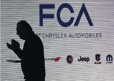  ?? DAN JANISSE/FILES ?? Fiat Chrysler CEO Sergio Marchionne exits the stage at University of Windsor in November 2016. Marchionne, a University of Windsor graduate who was revered locally for leading the beleaguere­d company from the brink of collapse in 2009, died Wednesday at the age of 66.
