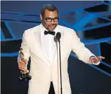  ?? CHIS PIZZELLO/THE ASSOCIATED PRESS ?? Jordan Peele is the first African-American to win for screenplay.