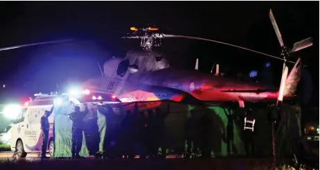  ?? Picture: Reuters/Athit Perawongme­tha ?? SAFE AT LAST: Rescued schoolboys are moved from a military helicopter to an awaiting ambulance at a military airport in Chiang Rai, Thailand.