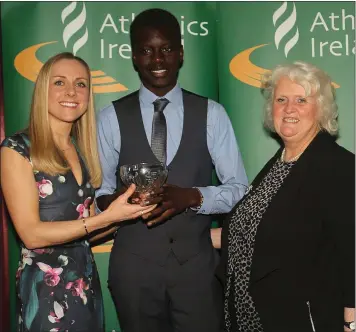  ??  ?? Wexford winner Peter O’Connor of Enniscorth­y Athletic Club receives his Athletics Ireland Emerald Crystal Star Award for 2016 from Georgina Drumm, President, Athletics Ireland, and Kerry O’Flaherty, Irish Olympian, at the Tullamore Court Hotel.