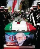  ??  ?? Fakhrizade­h’s funeral in Tehran
