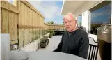  ?? PHOTO: MAARTEN HOLL/FAIRFAX NZ ?? Peter Aitchison on his terrace before the fence came down.