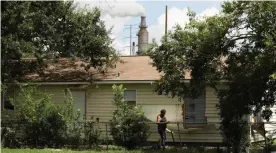  ??  ?? On the east side of Houston, the white plumes of the Texas oil and chemical refineries are a constant backdrop for residents of the Manchester neighbourh­ood. Photograph: Loren Elliott/Reuters