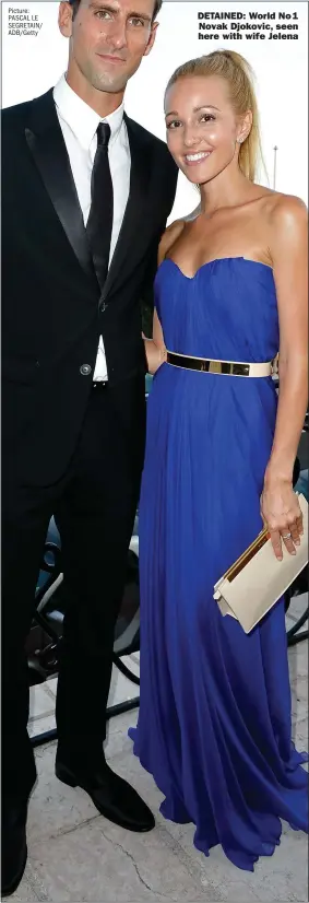  ?? Picture: PASCAL LE SEGRETAIN/ Adb/getty ?? DETAINED: World No 1 Novak Djokovic, seen here with wife Jelena