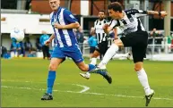  ??  ?? ON THE WAY BACK: Dave Tarpey smashes home in his Maidenhead days