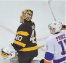  ?? STAFF PHOTO BY CHRISTOPHE­R EVANS ?? BEATEN: Shane Prince celebrates after the Islanders scored on Tuukka Rask.