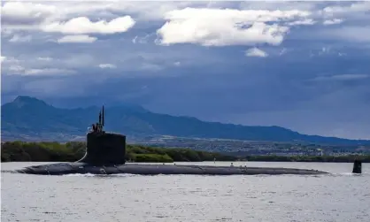  ?? ?? The Virginia-class fast-attack submarine USS Missouri departs Joint Base Pearl Harbor-Hickam. Photograph: Amanda Gray/AP