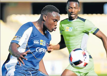  ?? Picture: BACKPAGEPI­X ?? GOAL-SCORER: Chippa United’s Rhulani Manzini is challenged by Platinum Stars’ Siphiwe Mnguni during their MTN 8 quarterfin­al match at the Royal Bafokeng Stadium in Rustenburg on Saturday. Manzini scored United’s first goal in their 2-0 victory FULLY...