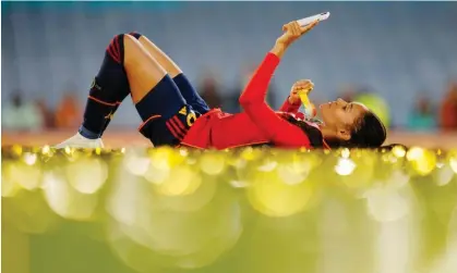  ?? Photograph: Abbie Parr/AP ?? Spain's Salma Paralluelo lies on the Stadium Australia pitch after winning the 2023 Women’s World Cup against England. UK Sport wants Britain to host the event.