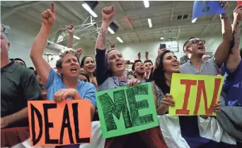  ?? JUSTIN SULLIVAN, GETTY IMAGES ?? Supporters cheer candidate Hillary Clinton during a Saturday rally in Fresno, Calif.