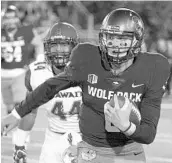  ?? TOM R. SMEDES/ASSOCIATED PRESS ?? Nevada quarterbac­k Ty Gangi (6) returns to help lead the Wolf Pack’s prolific passing attack.