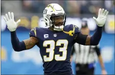  ?? JAE C. HONG — THE ASSOCIATED PRESS ?? Eagles rushers had best hold the ball tight on Sunday. Chargers safety Derwin James has forced three fumbles in the teams first seven games.