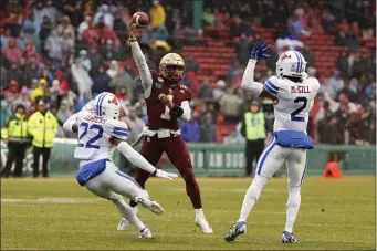  ?? WINSLOW TOWNSON — THE ASSOCIATED PRESS ?? Boston College Eagles quarterbac­k Thomas Castellano­s throws over Southern Methodist safety Jonathan McGill (2) during the first half of the Wasabi Fenway Bowl at Fenway Park Thursday, Dec. 28, 2023in Boston.