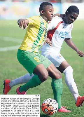  ?? FILE ?? Matthew Wilson of St George’s College (right) and Raewin Senior of Excelsior High battle for possession of the ball in their ISSA-FLOW Manning Cup football matchup at Winchester Park Friday, October 7. Excelsior won 1-0. The teams renew battle this...