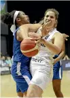  ??  ?? Tall Ferns captain Kalani Purcell, right, tussles with Jack Danielle Animan during the big win over the Philippine­s.
China’s former NBA star Yao Ming is in New Zealand for the qualifying tournament.