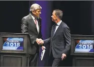  ?? Jessica Hill / Associated Press ?? Republican Party candidate Bob Stefanowsk­i, left, shakes hands with Democratic Party candidate Ned Lamont at the end of a gubernator­ial debate at the University of Connecticu­t in Storrs on Sept. 26.