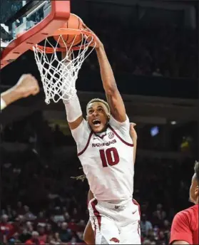  ?? Craven Whitlow/Special to News-Times ?? Thunder Dan: Arkansas' Daniel Gafford throws down a dunk against Indiana. The sophomore from El Dorado scored 27 points Sunday to lead the Razorbacks to a 7372 victory.
