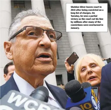  ??  ?? Sheldon Silver leaves court in 2018 after being convicted on a long list of charges. On Tuesday, he won a partial victory as the court cut his fine by millions after many of the conviction­s were overturned in January.