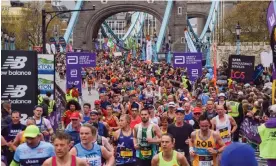  ?? Vuk Valcic/Alamy ?? Thousands of runners cross Tower Bridge during the 2023 London Marathon. Photograph: