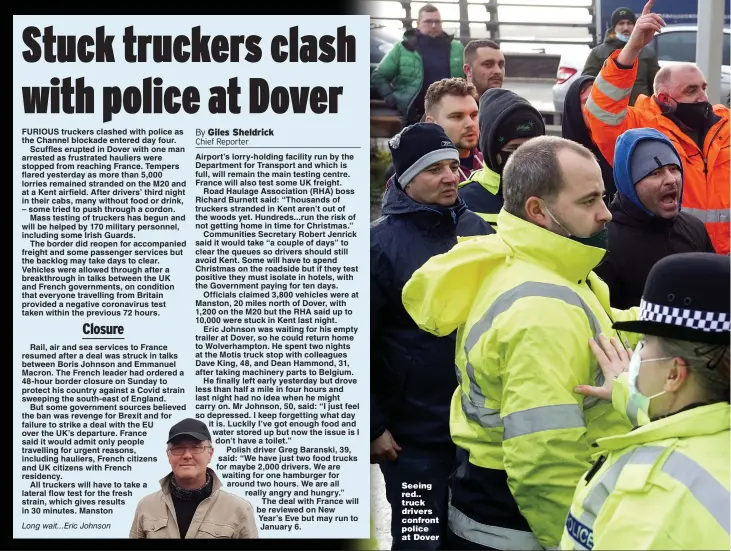  ??  ?? Seeing red.. truck drivers confront police at Dover