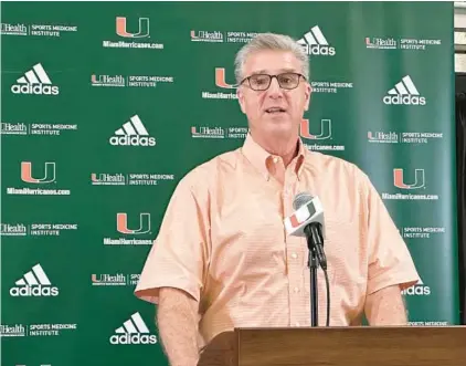  ?? ADAM LICHTENSTE­IN/SOUTH FLORIDA SUN ?? Miami athletic director Dan Radakovich speaks to reporters at Miami’s basketball media day Oct. 23.