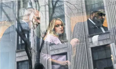  ?? YANA PASKOVA/GETTY IMAGES ?? Stormy Daniels and her lawyer arrive at the United States District Court Southern District of New York for Monday’s hearing.