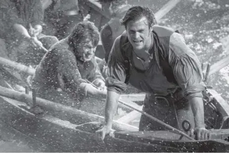  ?? Jonathan Prime, Warner Bros. Pictures ?? Chris Hemsworth, right, as Owen Chase, and Sam Keeley as Ramsdell, left, star in “In the Heart of the Sea,” which is based on the real-life whaling voyage that inspired “Moby-Dick.”