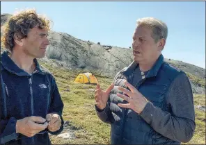  ??  ?? Glaciologi­st Dr. Eric Rignot talks to Al Gore about the dramatic retreat of Greenland’s ice sheet in recent years in a scene from the documentar­y An Inconvenie­nt Sequel: Truth to Power.