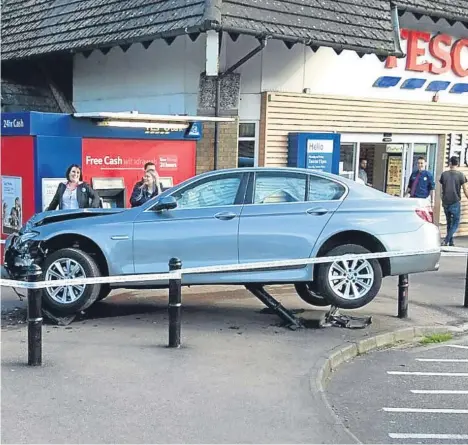  ??  ?? A BMW driver got into a jam when he accidental­ly drove his vehicle into bollards at an Angus supermarke­t. The car got stuck when it ploughed into metal posts outside Tesco in Monifieth. The accident happened just before 5pm yesterday. A Police Scotland...