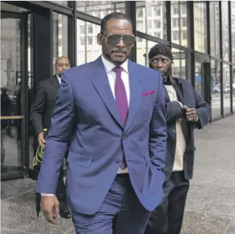  ?? ASHLEE REZIN GARCIA/ SUN- TIMES FILE ?? R. Kelly walks out of the Daley Center after a court hearing on March 13, 2019.