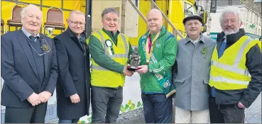  ?? ?? Grand marshal of the Fermoy St Patrick’s Day parade, local Stephen O’Leary, presenting a special award to Paul Kavanagh of Fermoy Tidy Towns, in the presence of , l-r: John Murphy, Diarmuid Gowen, PJ O’Leary and Donal Ó Lochlainn.