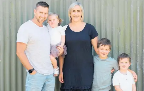  ?? ?? Doug Tait, new CEO of CHB District Council, with his wife Sarah and their three children.