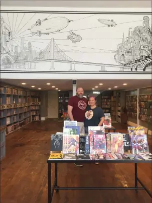  ?? THOMAS GASE — TIMES-HERALD ?? Dan and Natasha Curtis stand inside Zeppelin Comics in Benicia, which has been nominated for the Will Eisner Spirit of Comics Retailer Award for the second time in three years. This is a internatio­nal