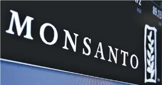  ??  ?? MONSANTO is displayed on a screen where the stock is traded on the floor of the New York Stock Exchange (NYSE) in New York City, May 9, 2016.