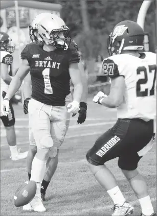  ?? File photo by Ernest A. Brown ?? Bryant senior wide receiver Matt Sewall (1) and the Bulldogs begin Northeast Conference play this afternoon against reigning conference champion Saint Francis.