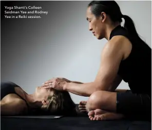  ??  ?? Yoga Shanti’s Colleen Saidman Yee and Rodney Yee in a Reiki session.