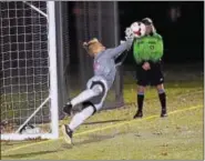  ?? AUSTIN HERTZOG — DIGITAL FIRST MEDIA ?? Hill School goalkeeper Aiden Perry makes the decisive save in Hill’s 12-11penalty kick win over Penn Charter in the PAISAA final.