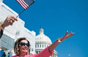  ?? ANDREW HARNIK/ASSOCIATED PRESS FILE PHOTO ?? House Speaker Nancy Pelosi waves following a 2019 news conference on the Capitol steps.