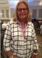  ?? PEG DEGRASSA - MEDIANEWS GROUP ?? Julianne DeFrancesc­o, 70, of Havertown beamed as she proudly wore the Gold medal she won in Team Bowling in the Delaware County Senior Games. DeFrancesc­o bowls regularly with her Saint Dorothy’s Bowling Team at Sproul Lanes.