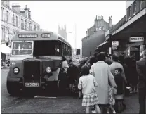  ??  ?? Crowds gather to board the bus to Blanefield, 1963, above. Picture: Don Martin