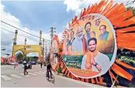  ?? — P. SURENDRA ?? Hoardings of Prime Minister Narendra Modi and other BJP leaders were erected in Hyderabad ahead of the BJP’S national executive meeting at the HICC on July 2.