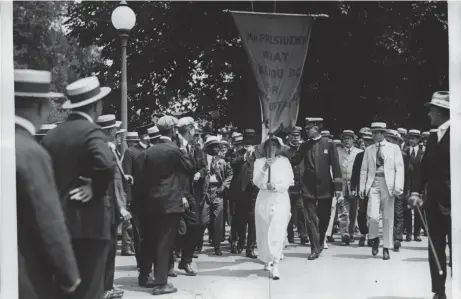  ?? JOURNAL SENTINEL FILES ?? Suffragett­es march in March, 1917, during President Woodrow Wilson’s second inaugural parade. With passage of the 19th amendment three years later, women were allowed to vote in the United States.