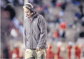  ??  ?? Bob Davie, shown during last season’s game against San Diego State, will not return as UNM head football coach in 2020.